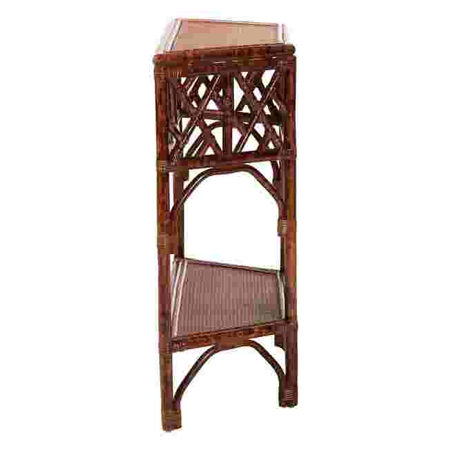 Side view of a rattan console table with lattice design and lower shelf.