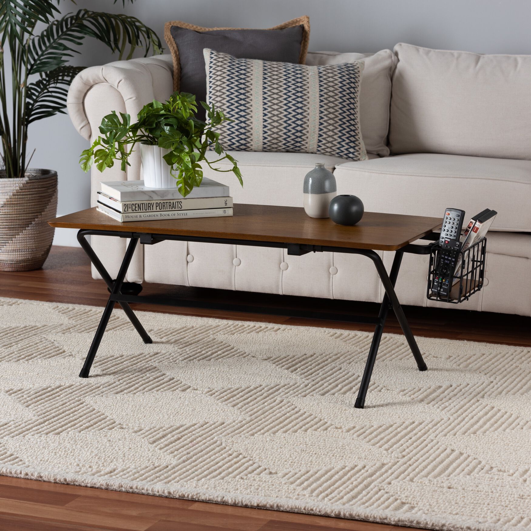 Coffee table with natural wood top and black metal base with wire basket