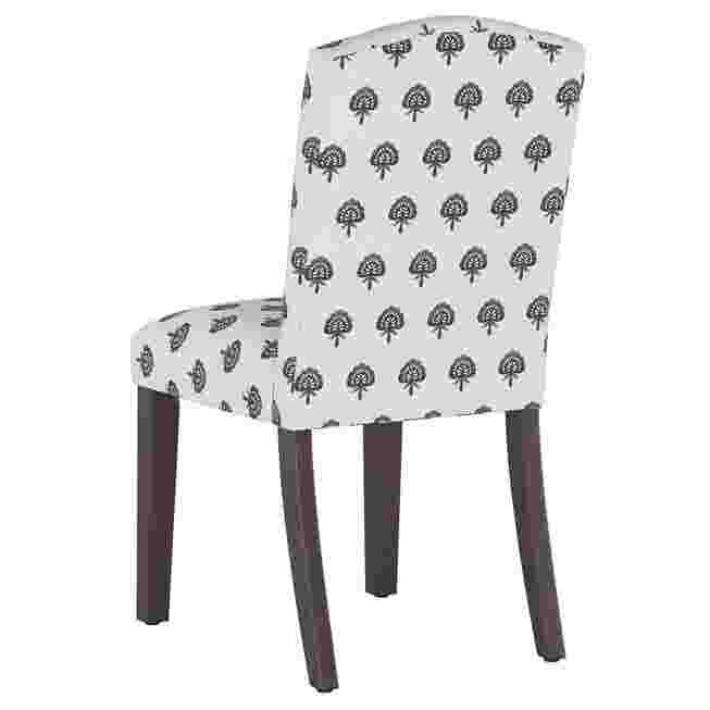 Back view of a block paisley back dining chair with a patterned fabric and dark wooden legs