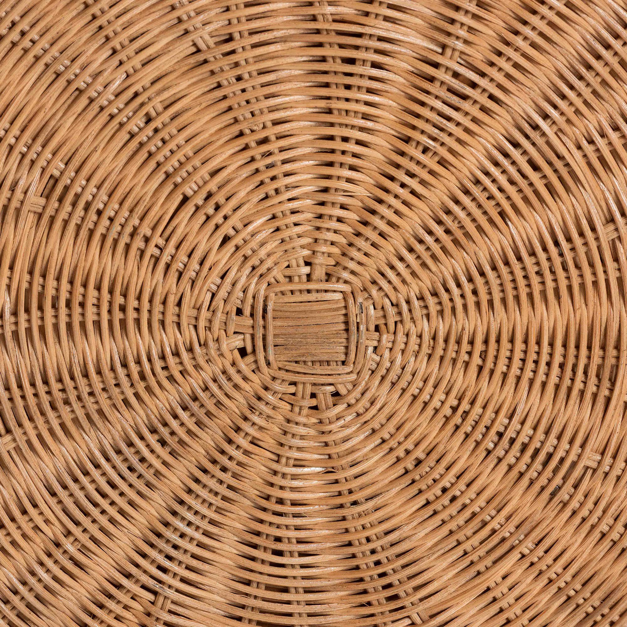Rattan construction detail at center of round ottoman