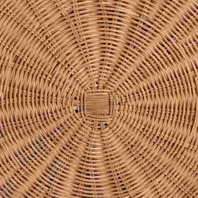 Rattan construction detail at center of round ottoman