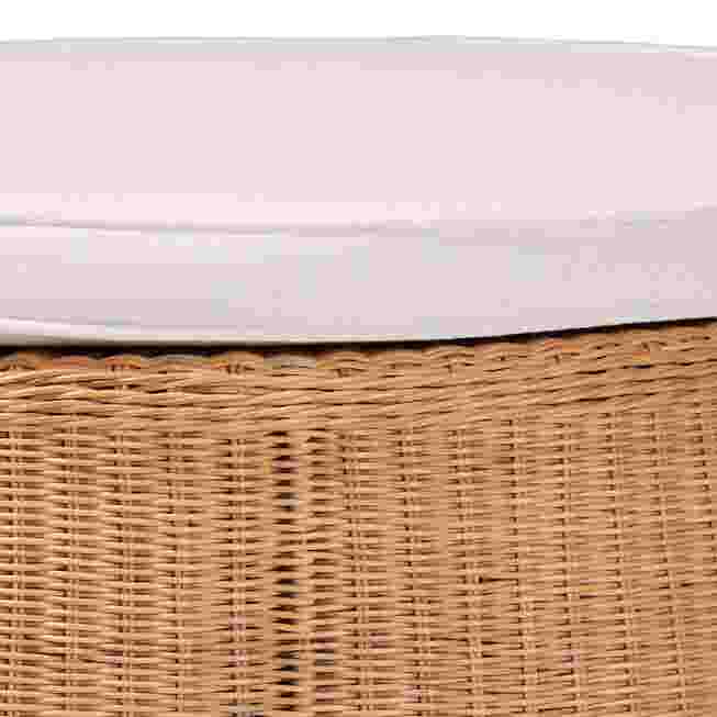 Close-up of woven rattan texture on round ottoman
