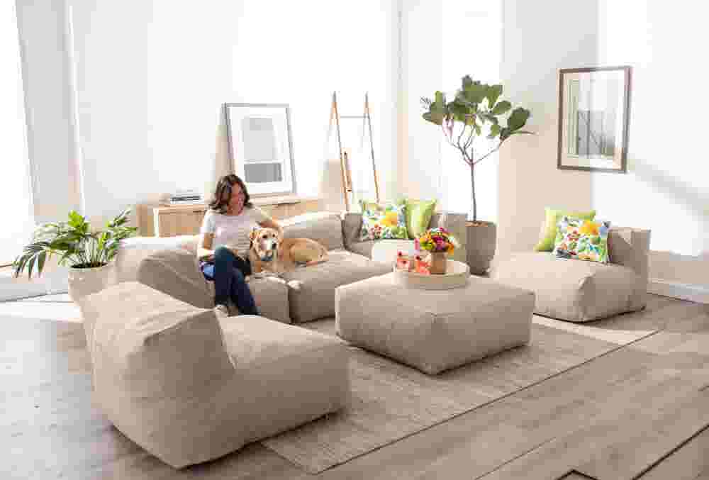 Beige modular corner patio chair with thick cushions