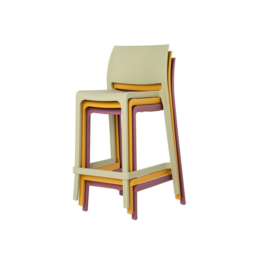 Stack of stacked yellow-green chairs