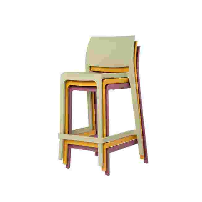 Stack of stacked yellow-green chairs