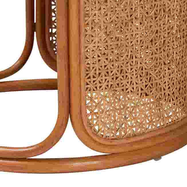Close-up of lattice corner detailing and legs of rattan end table