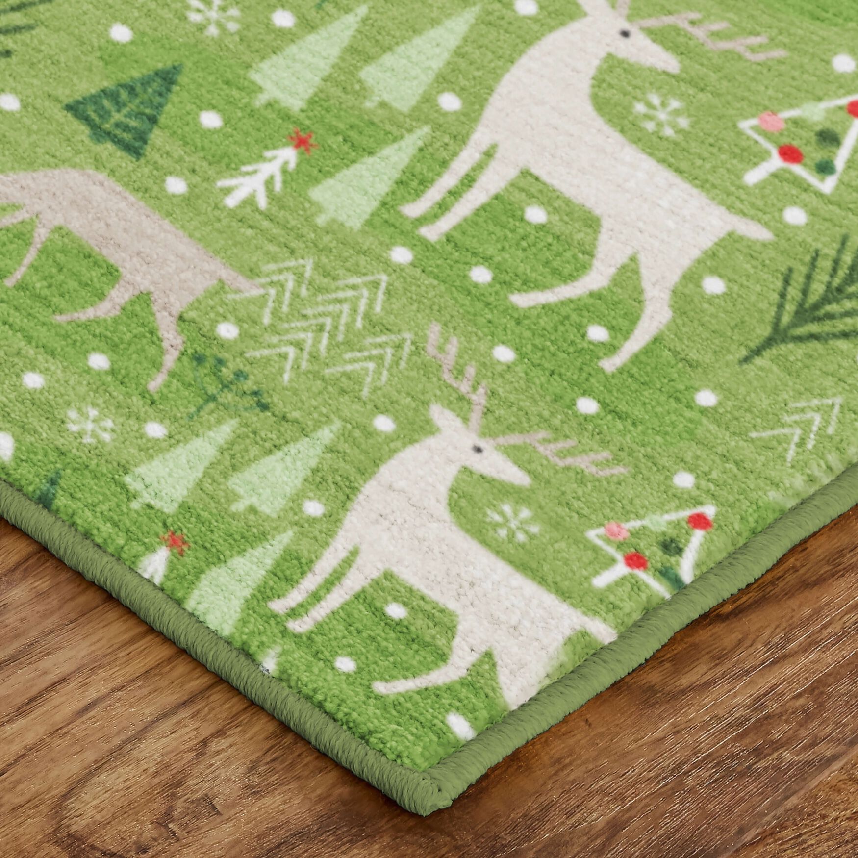 Reindeer Flurries Green Kitchen Rug, , on-hover image number 1