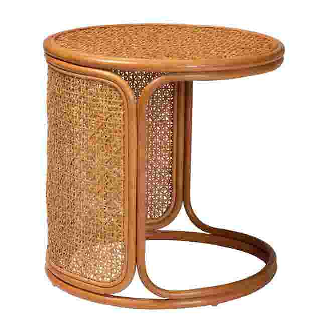 Rattan end table from side angle showing circular top and curved base