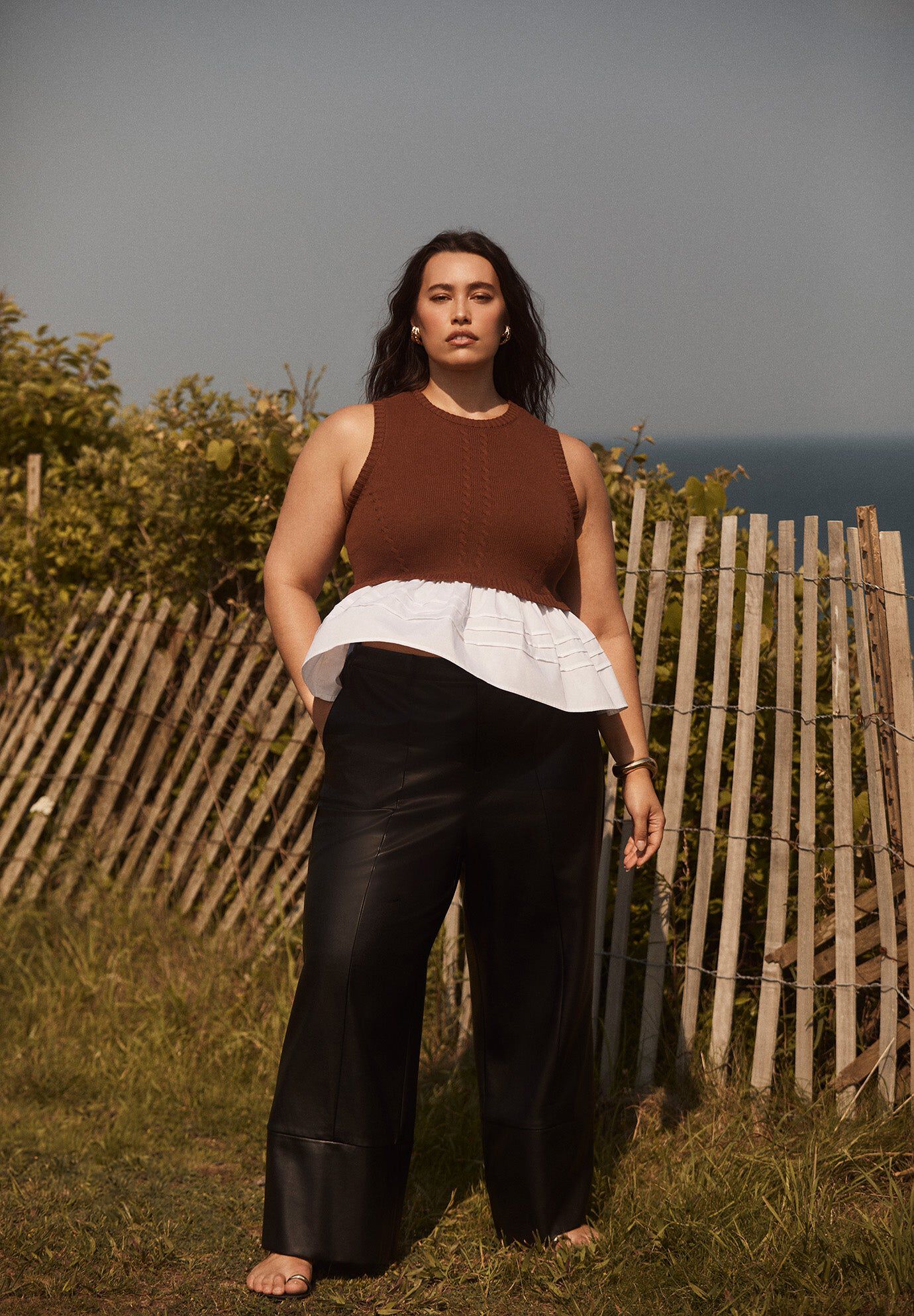 Sleeveless Peplum Sweater