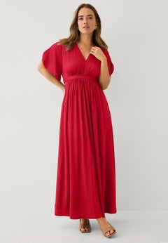 Stretch Knit Fit And Flare Elbow-Length Sleeve Tie-Back Maxi Dress